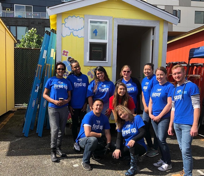 Fortis Edge Capital team volunteering to help build tiny homes.