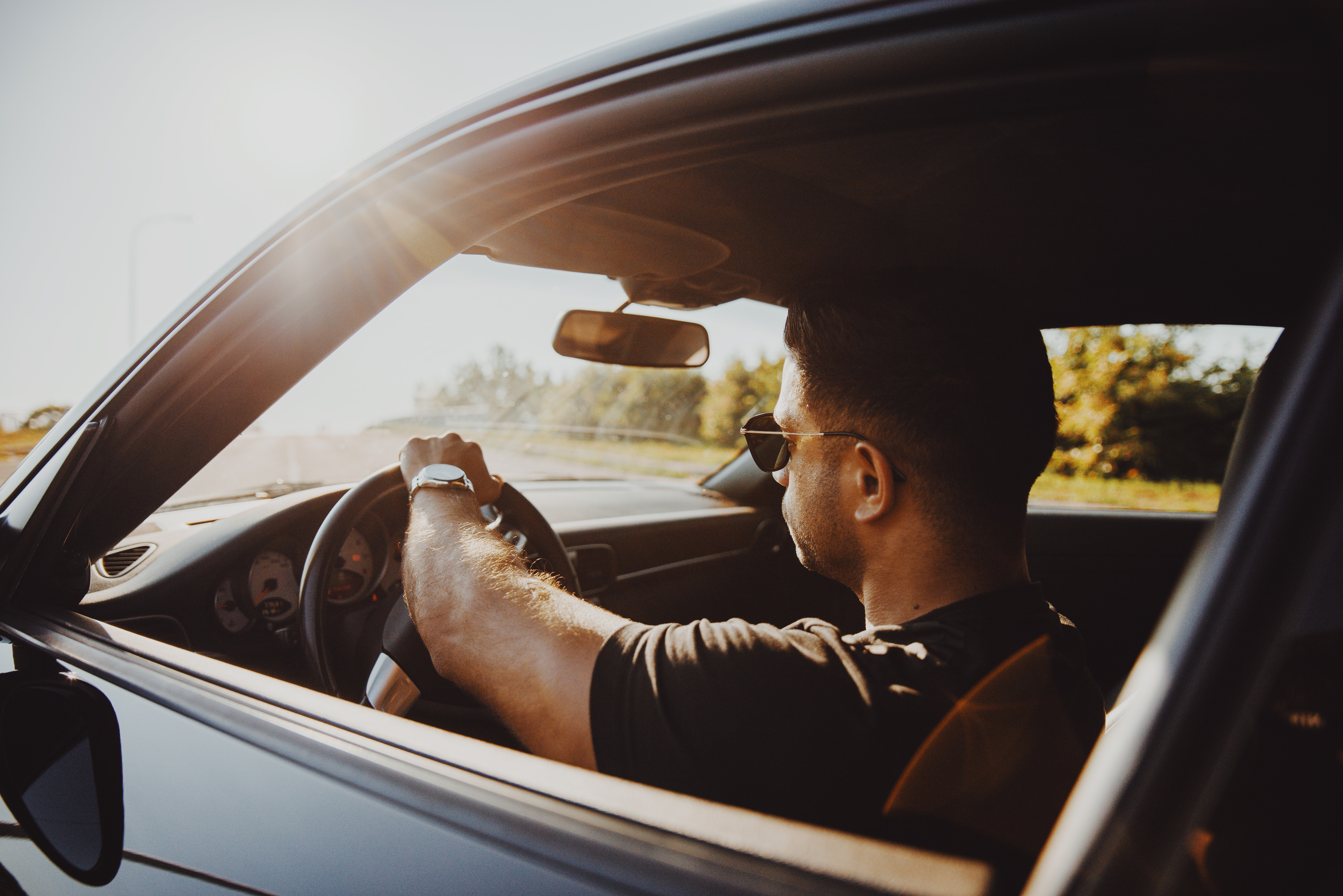 A man driving a car