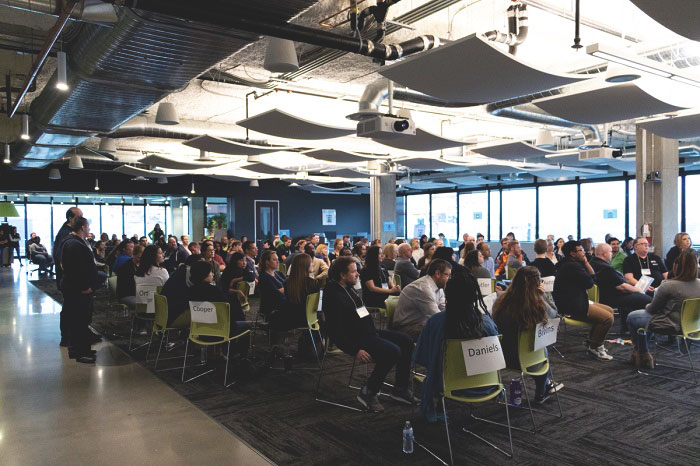 seattle credit union employees participating in a poverty simulation