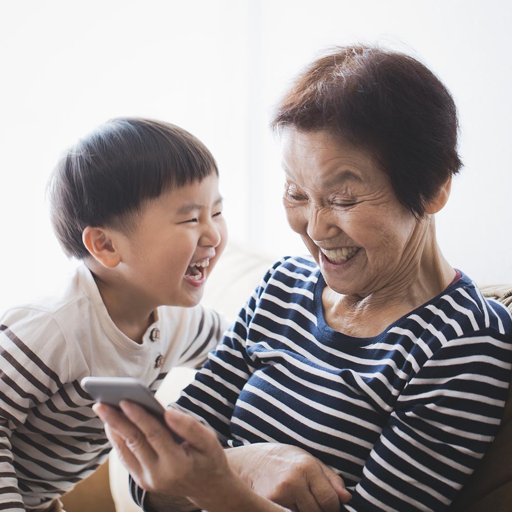 grandmother and grandson on the phone