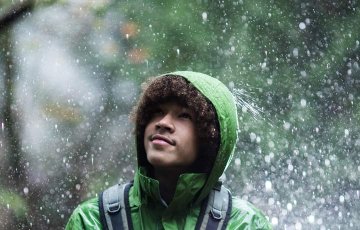 teenager in the rain