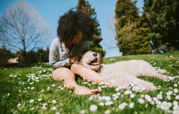 woman with her dog at the park